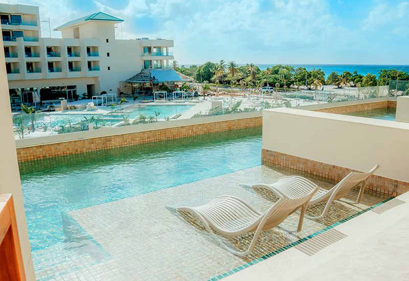 top-rated caribbean resorts with swim-up suites joia aruba by iberostar adults-only travel tips